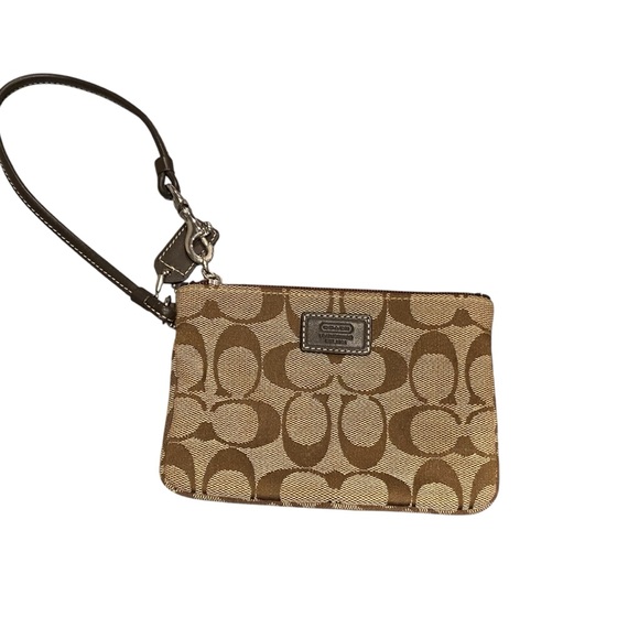 Coach Handbags - Like New Coach Signature Corner Zip Wristlet